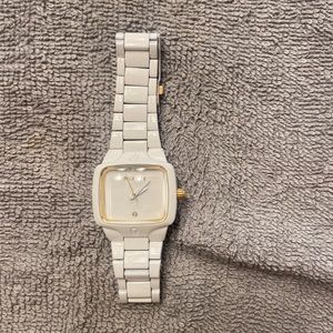 Nixon “the smallest player” womens watch